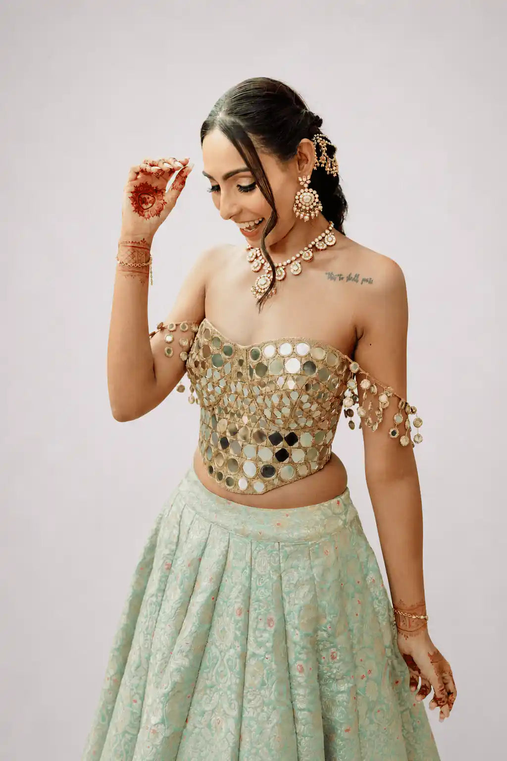 Zeenat – Mint Brocade Lehenga Set with Gold Mirror Corset - truzee