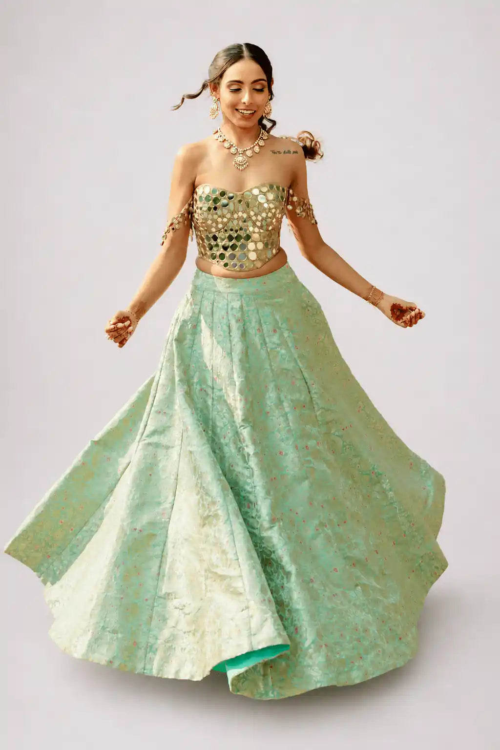 Zeenat – Mint Brocade Lehenga Set with Gold Mirror Corset - truzee