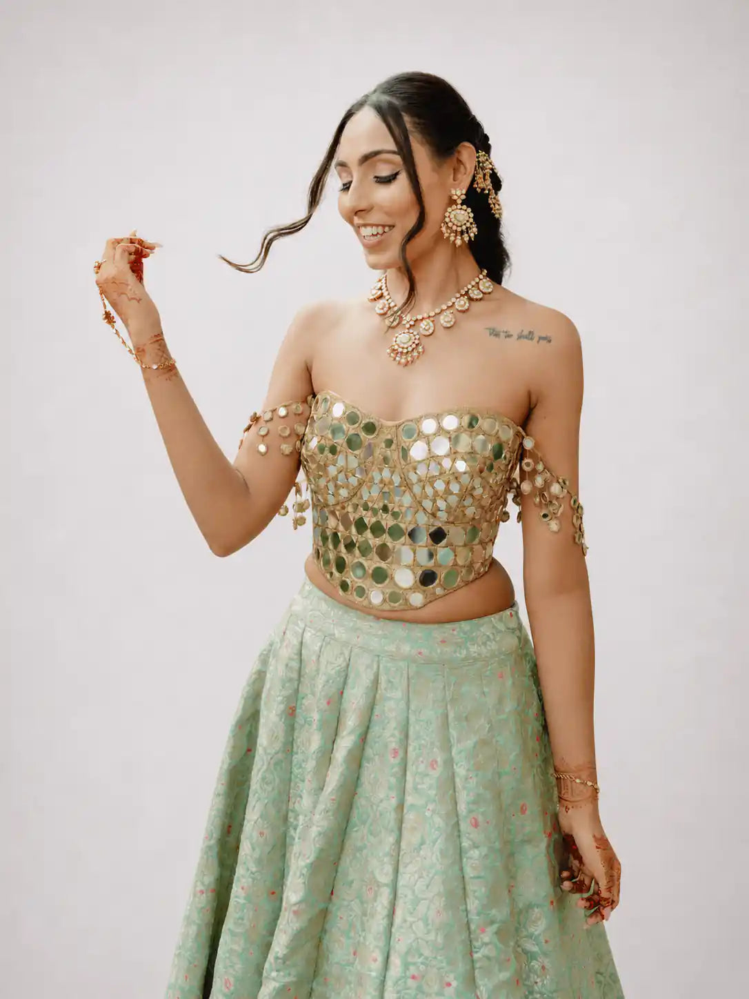 Zeenat – Mint Brocade Lehenga Set with Gold Mirror Corset - truzee